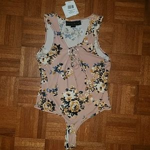 NWT Blush floral bodysuit